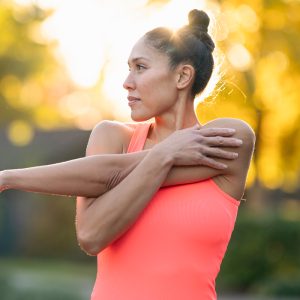 woman stretching after workout